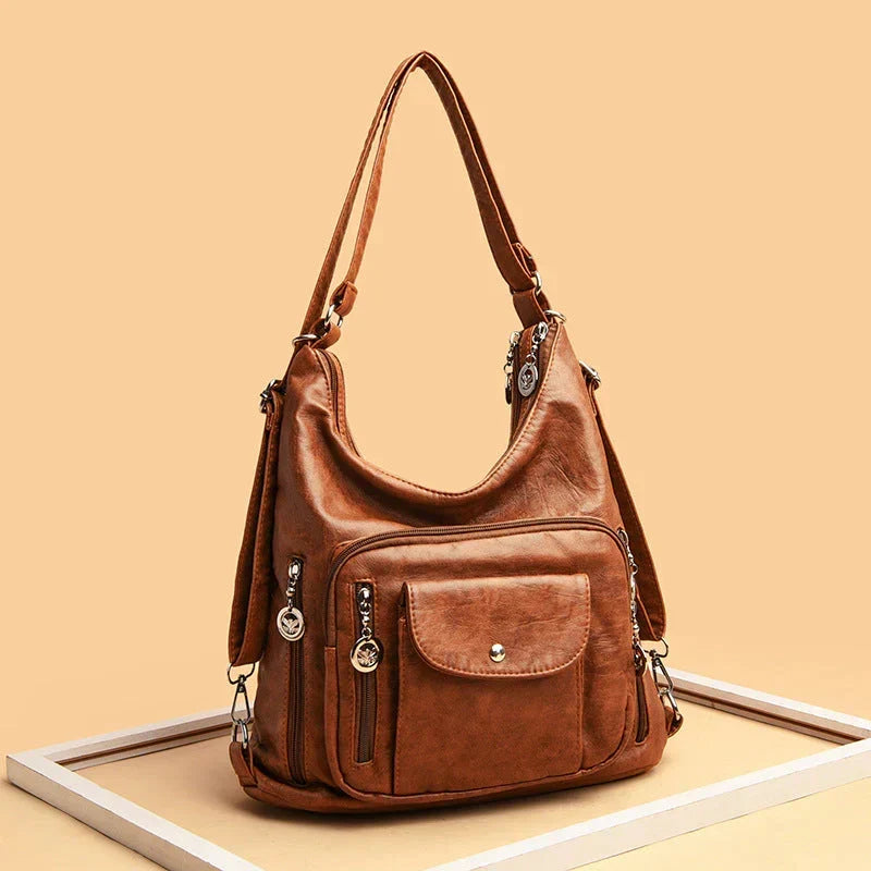 Sac porté épaule femme en cuir souple, multipoches, zippé