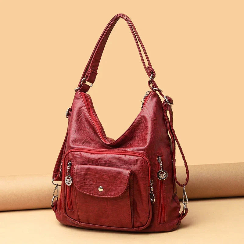 Sac porté épaule femme en cuir souple, multipoches, zippé