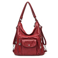 Sac porté épaule femme en cuir souple, multipoches, zippé, rouge vin