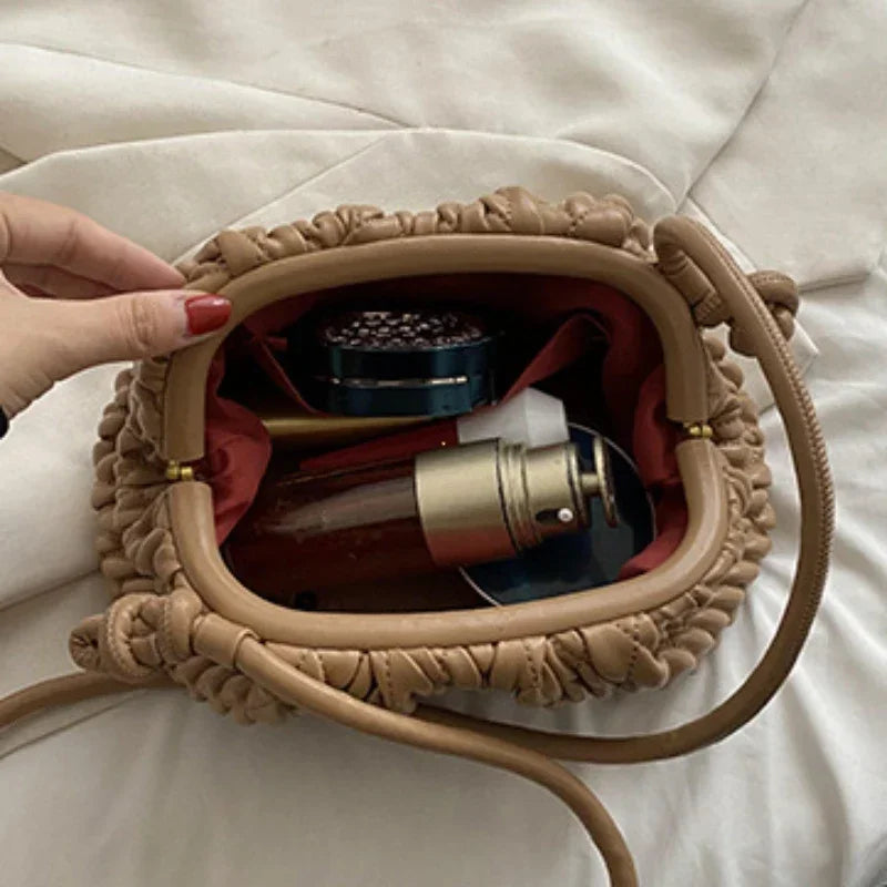 Pochette bandoulière femme matelassée, forme trapèze