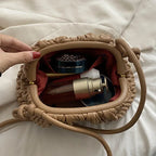 Pochette bandoulière femme matelassée, forme trapèze