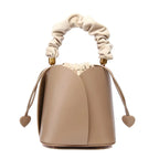 Petit sac seau femme en cuir, deux anses interchangeables, beige