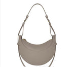 Sac selle femme en cuir grainé, format compact, quatre coloris, gris éléphant grainé