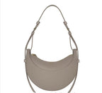 Sac selle femme en cuir grainé, format compact, quatre coloris