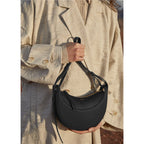 Sac selle femme en cuir grainé, format compact, quatre coloris