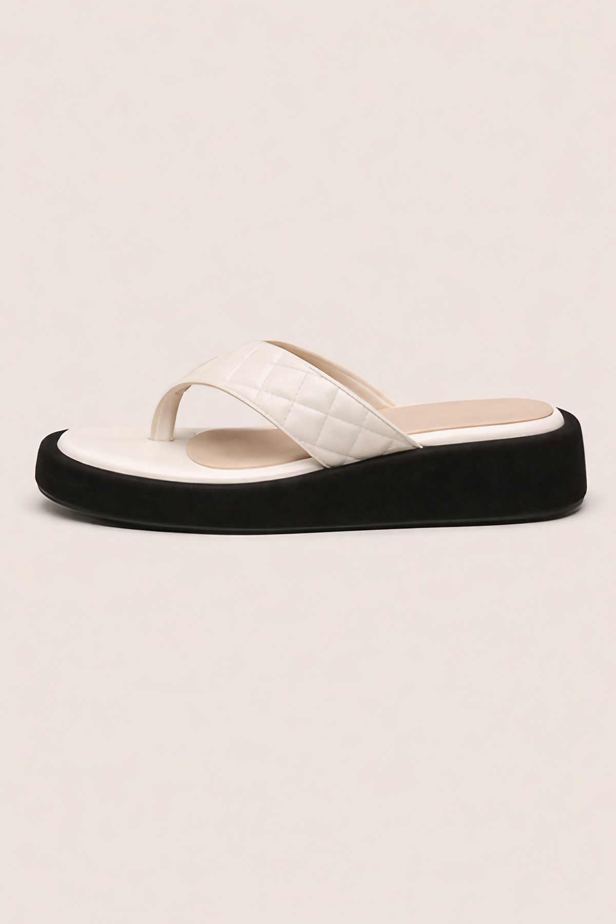 Tongs femme à semelle épaisse et bride rembourrée