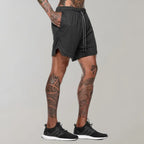 Short de sport homme avec sous-short de compression et poches