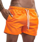 Short de bain homme doublé, cordon et poches, quatorze coloris, orange