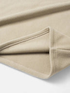 Sweat homme à col montant zippé, détails brodés