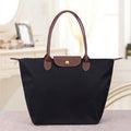 Sac porté épaule femme zippé, trois formats, neuf coloris, noir
