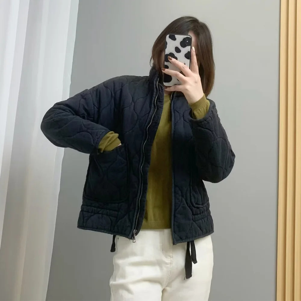 Veste matelassée femme zippée à poches, piqûres arrondies