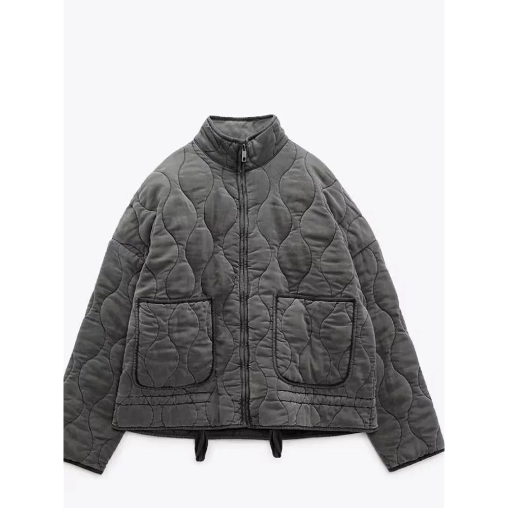 Veste matelassée femme zippée à poches, piqûres arrondies, gris