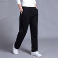 Pantalon de jogging homme fuselé, poches zippées, cordon, noir