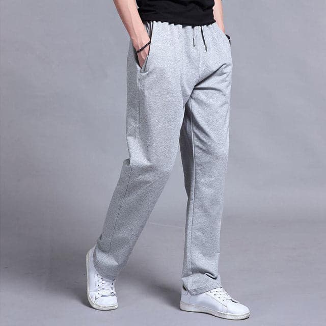 Pantalon de jogging homme fuselé, poches zippées, cordon