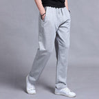 Pantalon de jogging homme fuselé, poches zippées, cordon