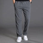 Pantalon de jogging homme fuselé, poches zippées, cordon, gris foncé