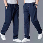 Pantalon de jogging homme fuselé, poches zippées, cordon, bleu foncé
