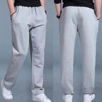 Pantalon de jogging homme fuselé, poches zippées, cordon, gris clair