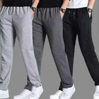 Pantalon de jogging homme fuselé, poches zippées, cordon